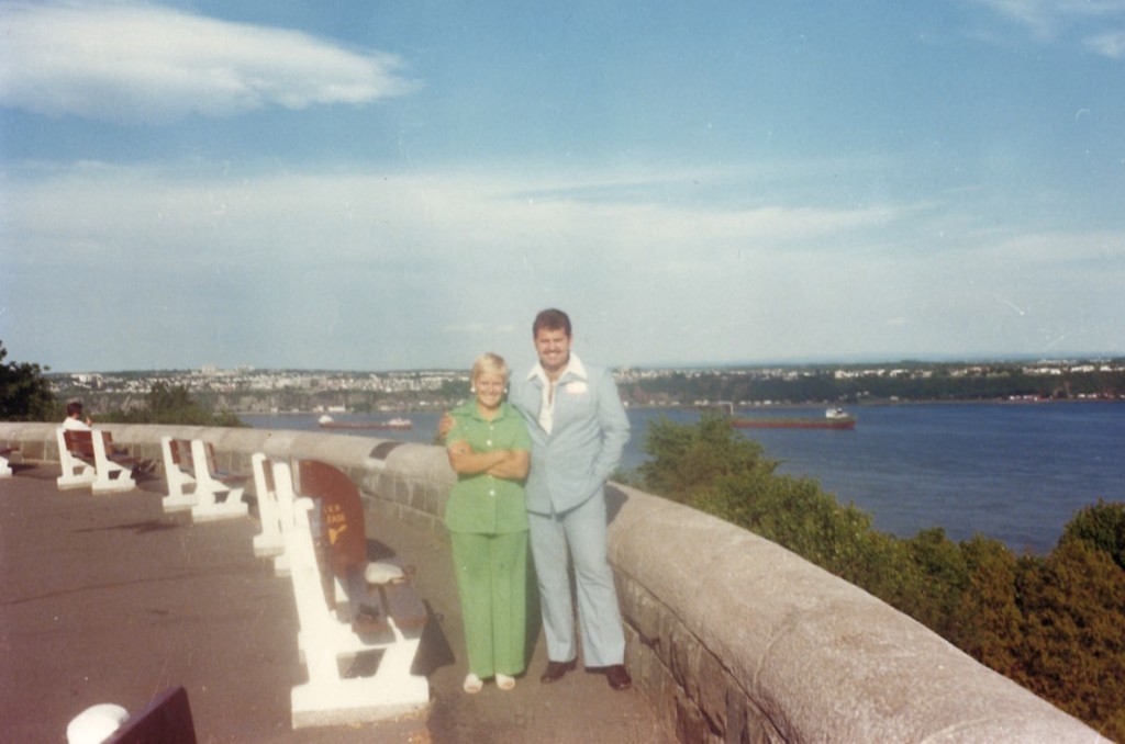 Dave and Lee at a scenic overlook with ships in the background